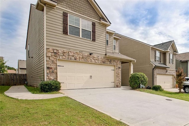 529 Dasheill Ln, Atlanta, GA 30349 - view of front of property with stone siding, a garage, and driveway