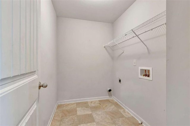 529 Dasheill Ln, Atlanta, GA 30349 - washroom featuring washer hookup, electric dryer hookup, and stone finish floors