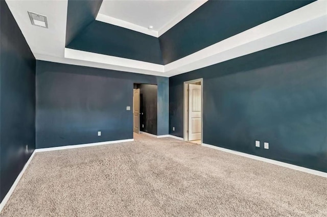 529 Dasheill Ln, Atlanta, GA 30349 - empty room with a raised ceiling and carpet