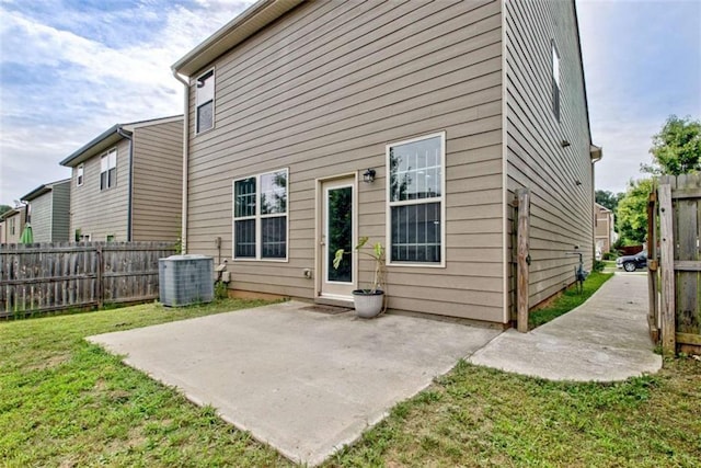 529 Dasheill Ln, Atlanta, GA 30349 - back of house featuring a patio