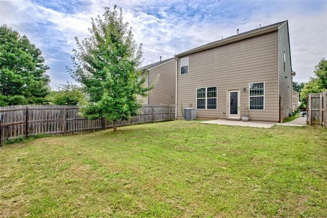529 Dasheill Ln, Atlanta, GA 30349 - back of house with a patio area and a fenced backyard