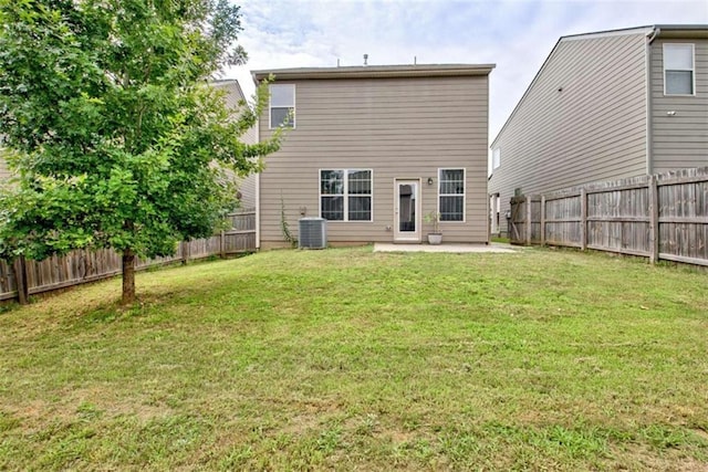 529 Dasheill Ln, Atlanta, GA 30349 - rear view of property featuring a patio and a fenced backyard