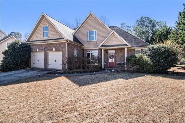 view of front of property featuring concrete driveway, brick siding, and an attached garage