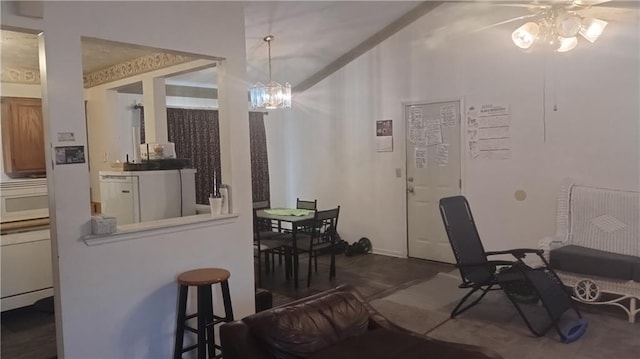dining area featuring a ceiling fan and baseboards