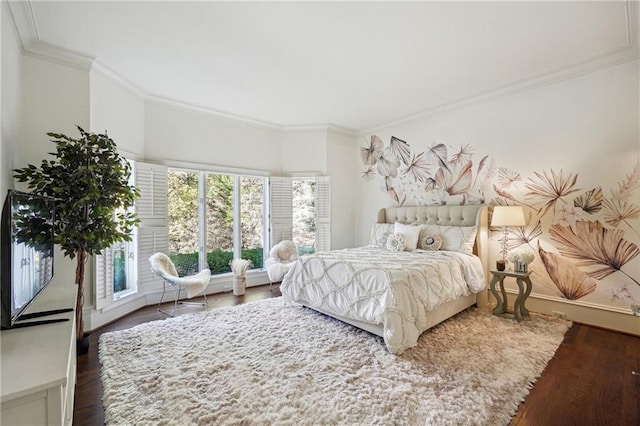 bedroom with dark hardwood / wood-style flooring and ornamental molding