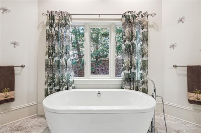 bathroom with a washtub