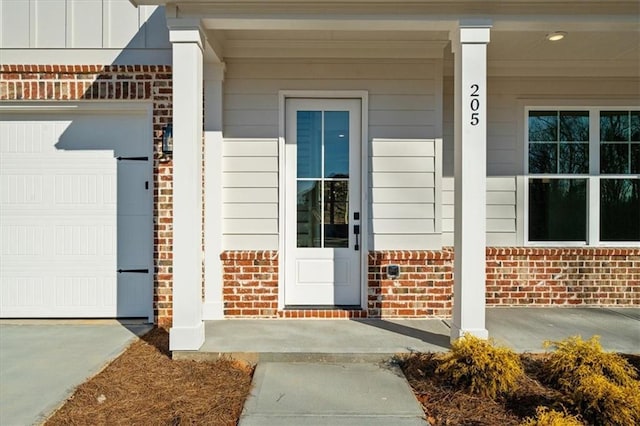 property entrance with a garage