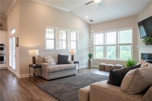 2665 Crowbrook Way, Cumming, GA 30040 - living area featuring ceiling fan, baseboards, dark wood-style flooring, vaulted ceiling, and a fireplace