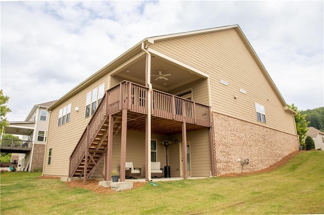 2665 Crowbrook Way, Cumming, GA 30040 - rear view of property featuring a ceiling fan, brick siding, a lawn, and a wooden deck