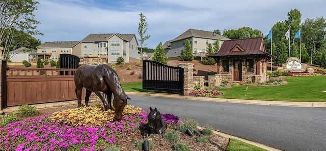 2665 Crowbrook Way, Cumming, GA 30040 - community / neighborhood sign with a residential view and a gate