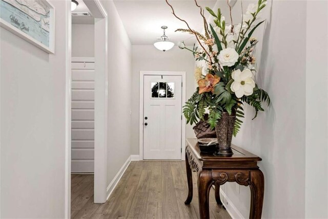 1311 Calgary Lk, Winder, GA 30680 - entrance foyer featuring light wood-type flooring and baseboards