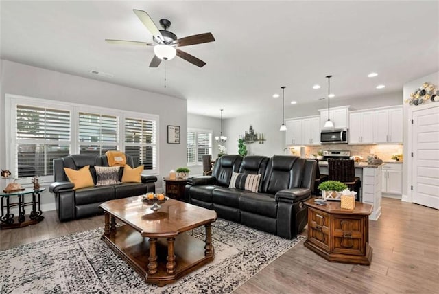 1311 Calgary Lk, Winder, GA 30680 - living area featuring ceiling fan, light wood-type flooring, and recessed lighting