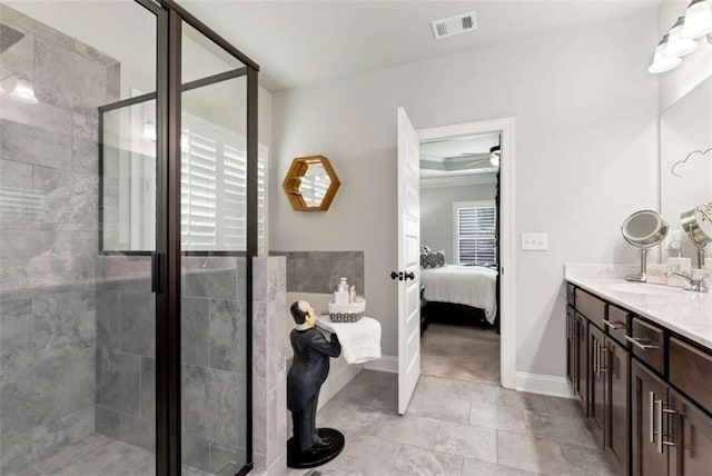 1311 Calgary Lk, Winder, GA 30680 - full bath with ensuite bathroom, vanity, a stall shower, and ceiling fan