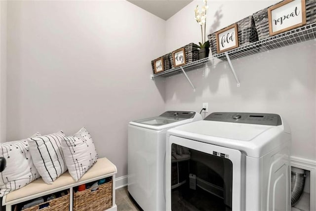 1311 Calgary Lk, Winder, GA 30680 - washroom with separate washer and dryer and baseboards