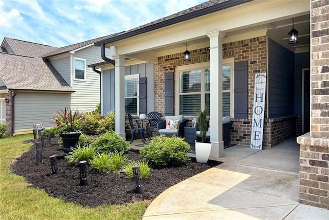 1311 Calgary Lk, Winder, GA 30680 - view of exterior entry with brick siding and covered porch