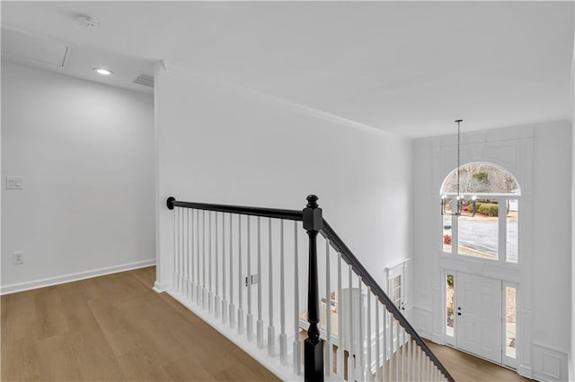 interior space with an inviting chandelier and wood-type flooring