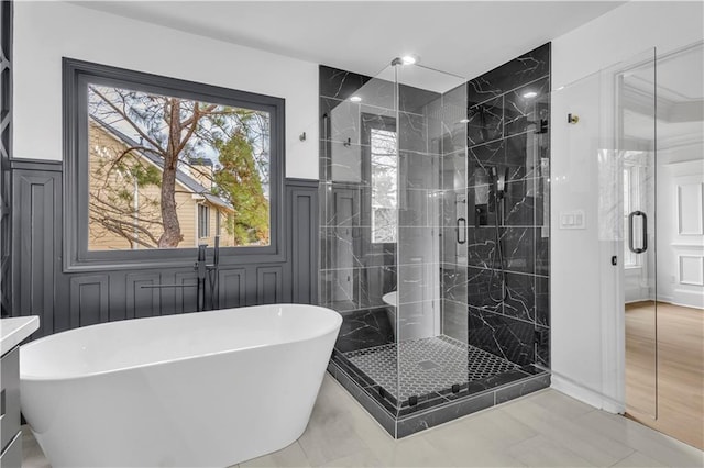 bathroom featuring plus walk in shower