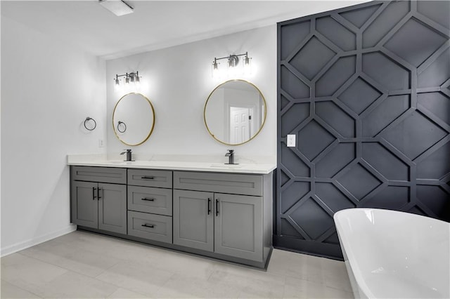 bathroom featuring vanity and a tub