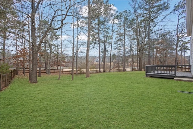 view of yard with a wooden deck