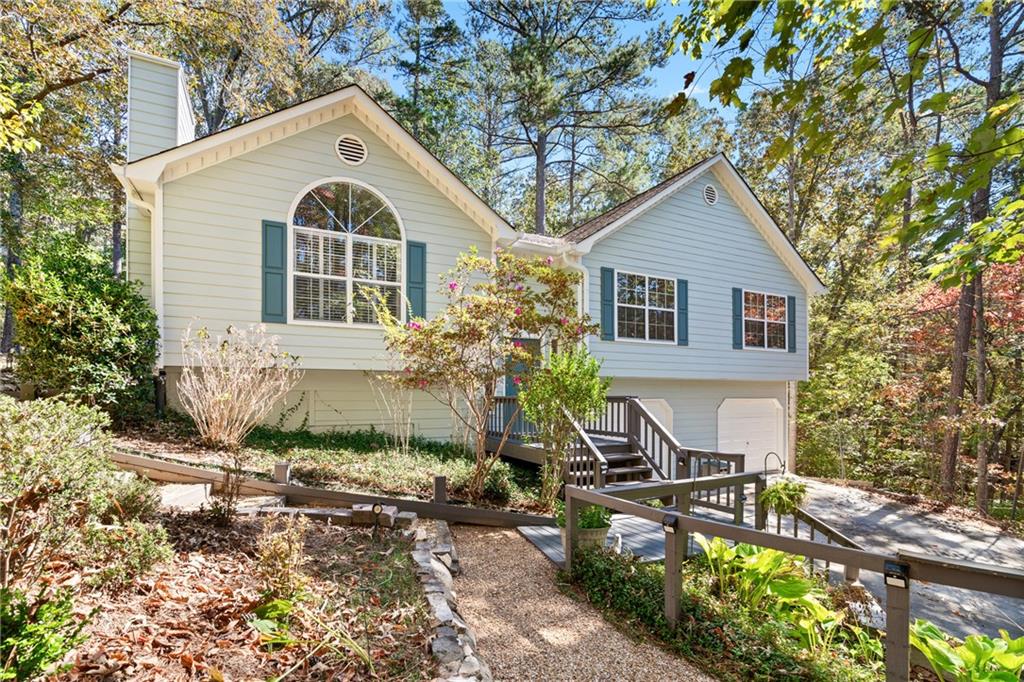 view of front of property with a garage