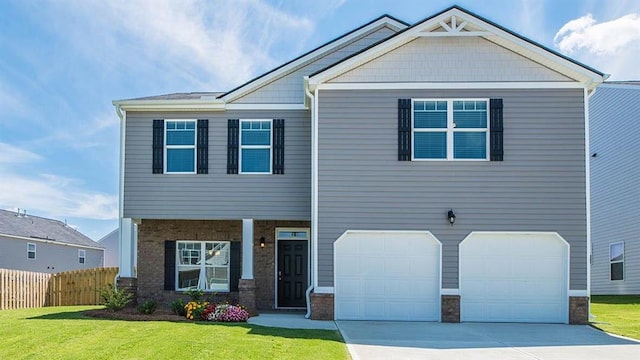 craftsman inspired home featuring a front lawn and a garage