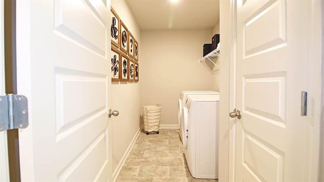 laundry area with separate washer and dryer