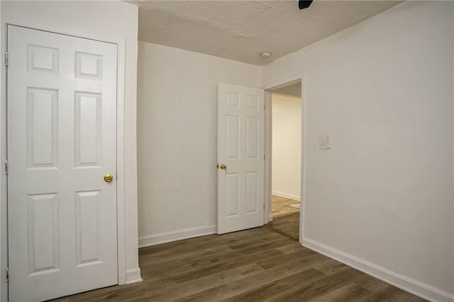 2437 Clarissa Dr NW, Atlanta, GA 30318 - spare room with wood finished floors and a smoke detector