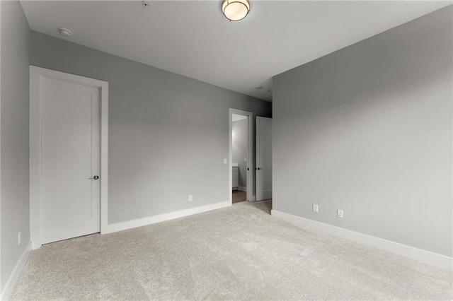 1420 Coretta Bnd, Atlanta, GA 30318 - unfurnished room with carpet, baseboards, and a smoke detector