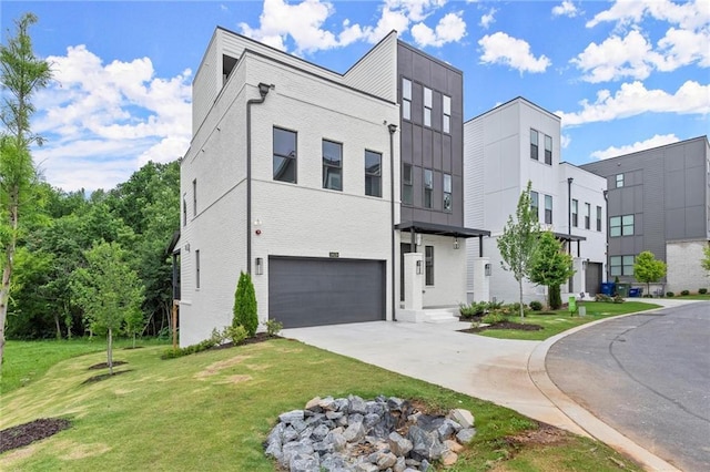 1420 Coretta Bnd, Atlanta, GA 30318 - view of front of property with a garage, a front yard, and driveway