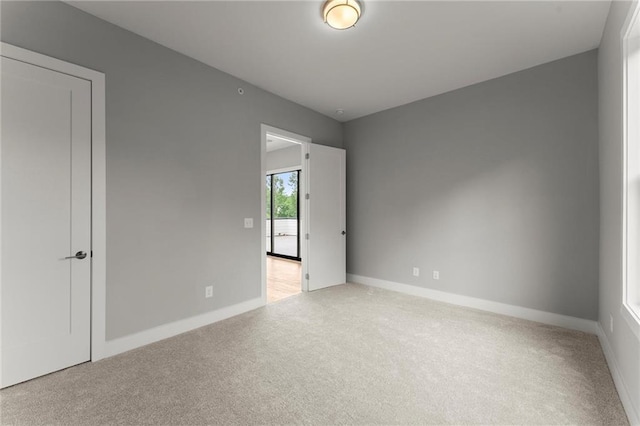 1420 Coretta Bnd, Atlanta, GA 30318 - carpeted spare room with baseboards