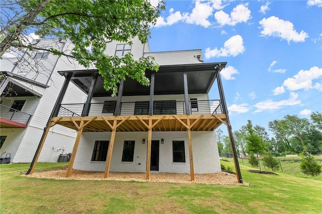 1420 Coretta Bnd, Atlanta, GA 30318 - rear view of house with a lawn and brick siding