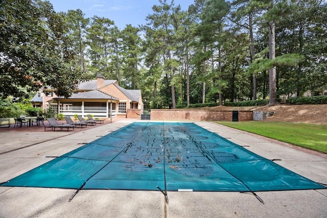 view of pool with a patio area