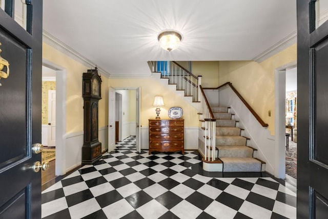 foyer entrance with ornamental molding