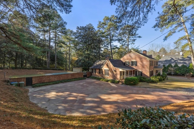 view of property exterior featuring a garage