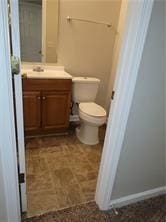 1752 Spring Hill Cv, Lithonia, GA 30058 - bathroom featuring vanity and toilet