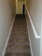 1752 Spring Hill Cv, Lithonia, GA 30058 - stairs with baseboards