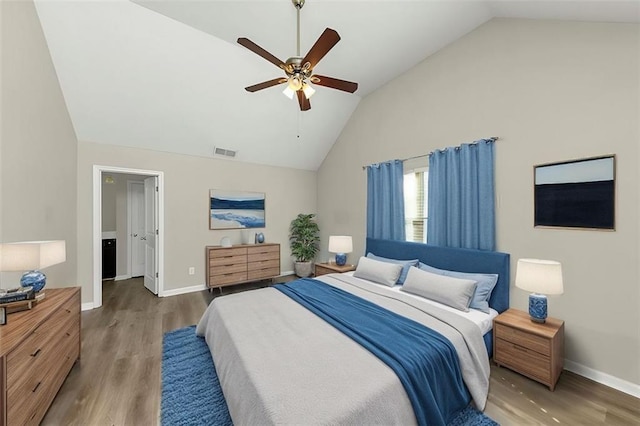 bedroom featuring lofted ceiling, hardwood / wood-style floors, and ceiling fan