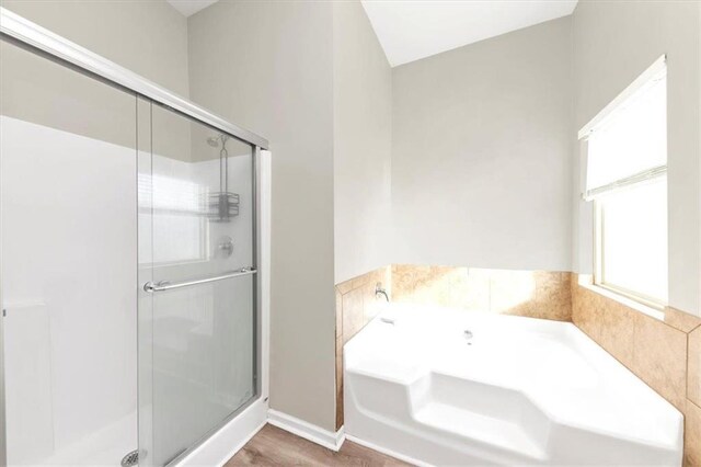 bathroom with toilet, wood-type flooring, and vanity