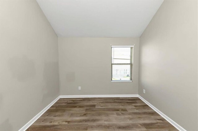 unfurnished room with light wood-type flooring