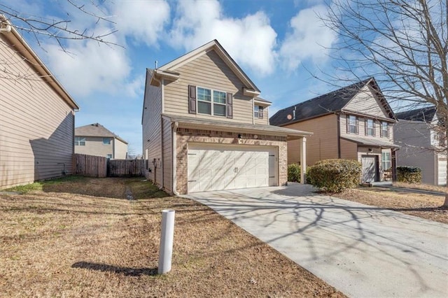 view of front of house featuring a garage and a front lawn