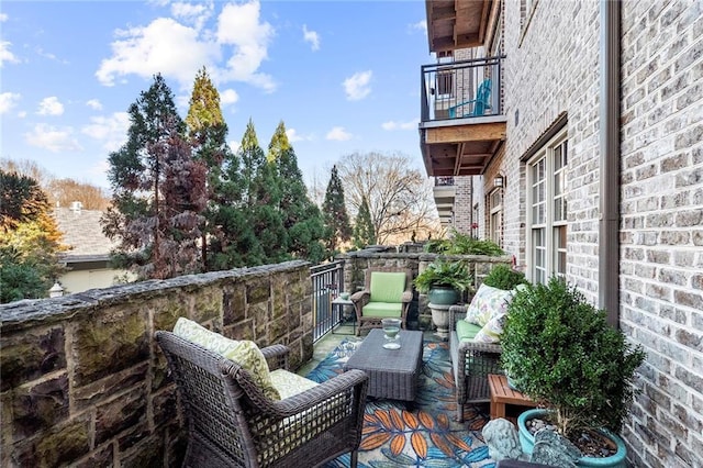 1055 Piedmont Ave NE Unit 106, Atlanta, GA 30309 - wooden terrace featuring outdoor lounge area