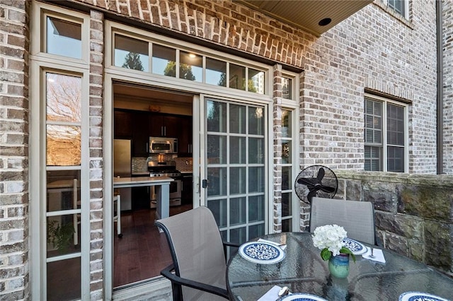 1055 Piedmont Ave NE Unit 106, Atlanta, GA 30309 - wooden deck with outdoor dining area