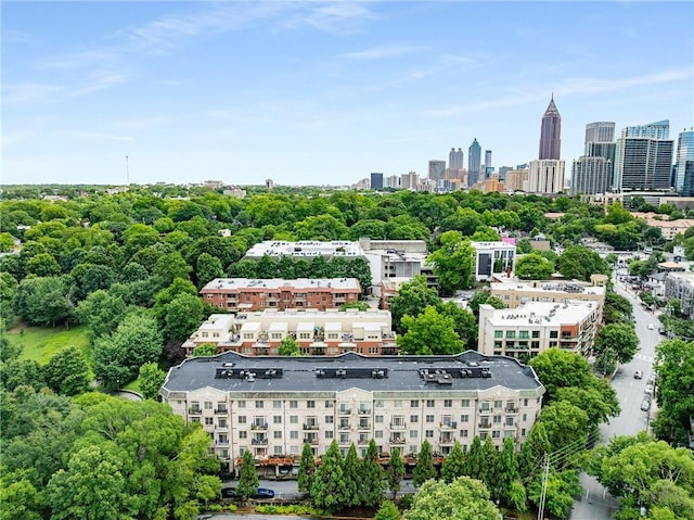1055 Piedmont Ave NE Unit 106, Atlanta, GA 30309 - bird's eye view of city skyline and a tree filled landscape