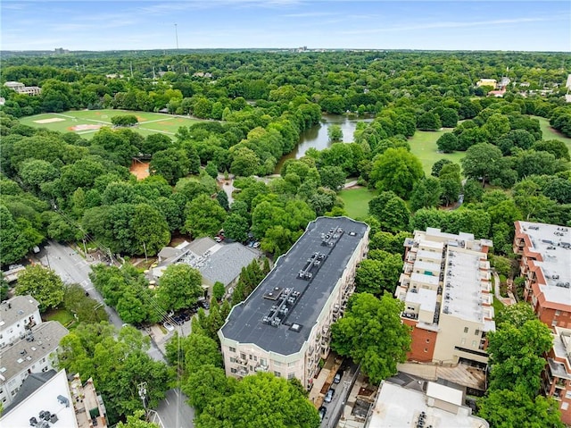 1055 Piedmont Ave NE Unit 106, Atlanta, GA 30309 - drone / aerial view of a large body of water and a tree filled landscape