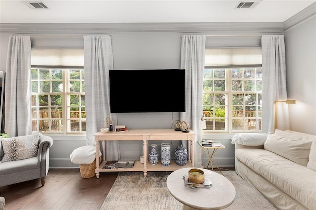 1055 Piedmont Ave NE Unit 106, Atlanta, GA 30309 - living room featuring wood finished floors, plenty of natural light, and ornamental molding