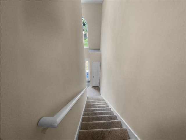 stairs with a towering ceiling