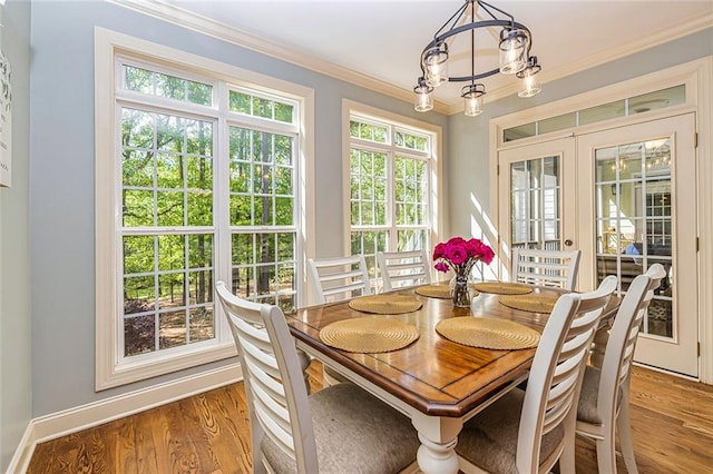 20 Jasmine Ct, Newnan, GA 30265 - dining room featuring a chandelier, ornamental molding, and wood finished floors