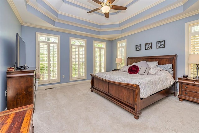 20 Jasmine Ct, Newnan, GA 30265 - bedroom with crown molding, carpet floors, a tray ceiling, and a ceiling fan