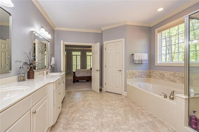20 Jasmine Ct, Newnan, GA 30265 - bathroom featuring healthy amount of natural light, double vanity, a garden tub, ornamental molding, and recessed lighting