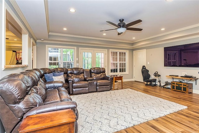 20 Jasmine Ct, Newnan, GA 30265 - living room with ceiling fan, wood finished floors, ornamental molding, a raised ceiling, and french doors